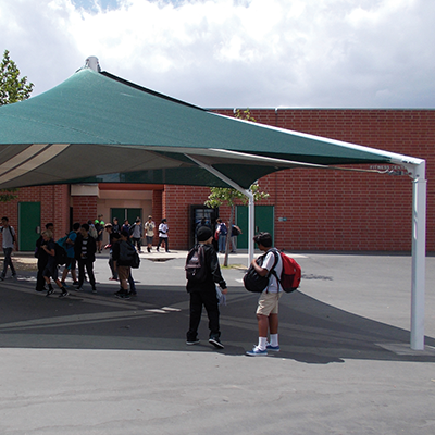 Shade structures like canopies, in public environments, providing shade and UV protection.